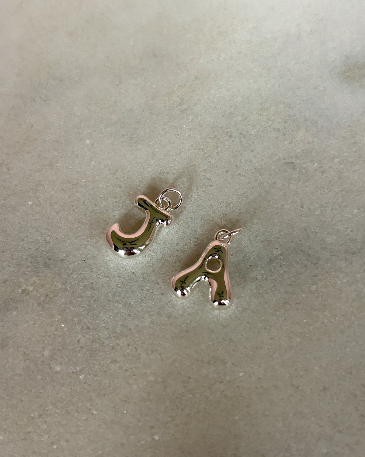 Initial Charms