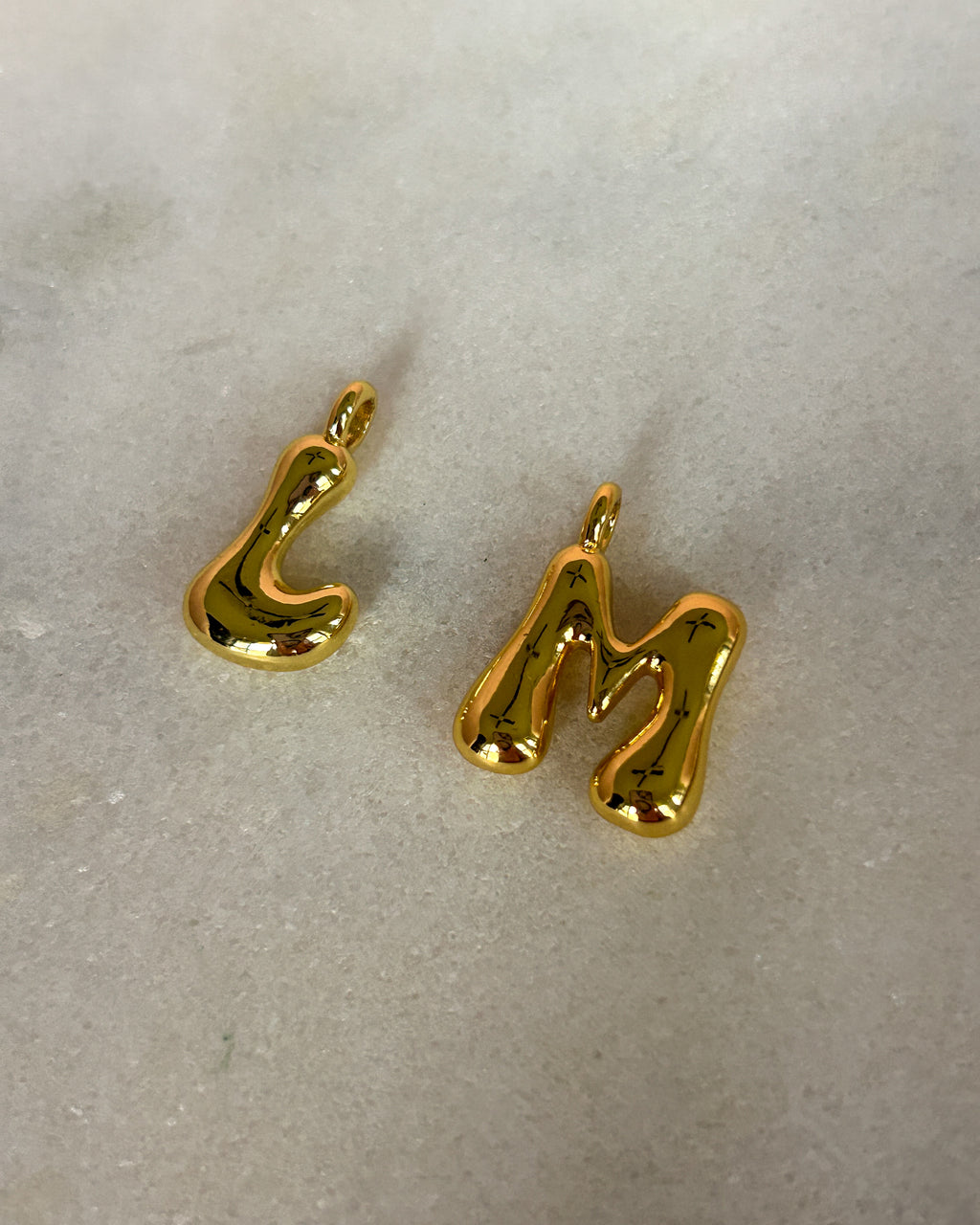 Initial Charms