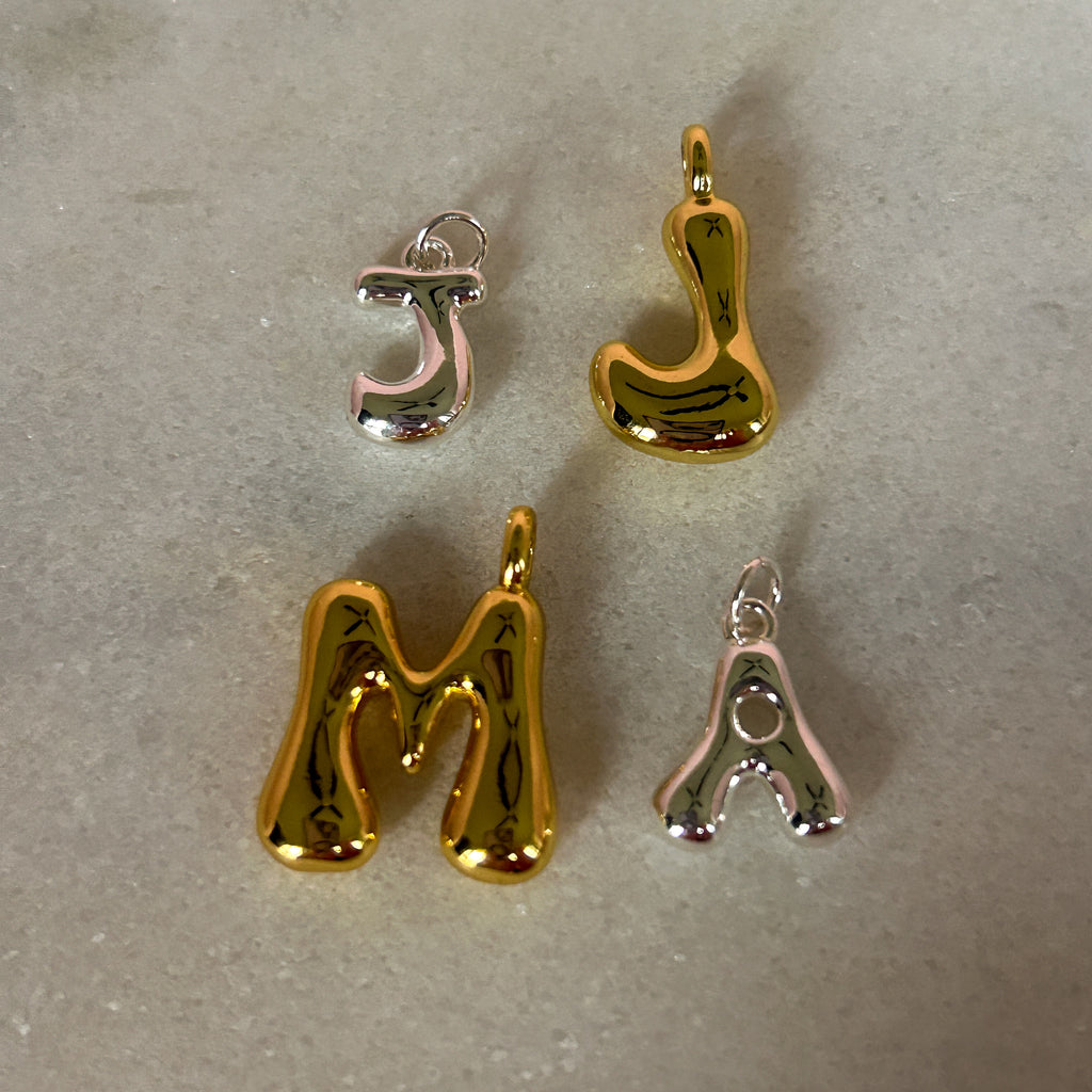 Initial Charms